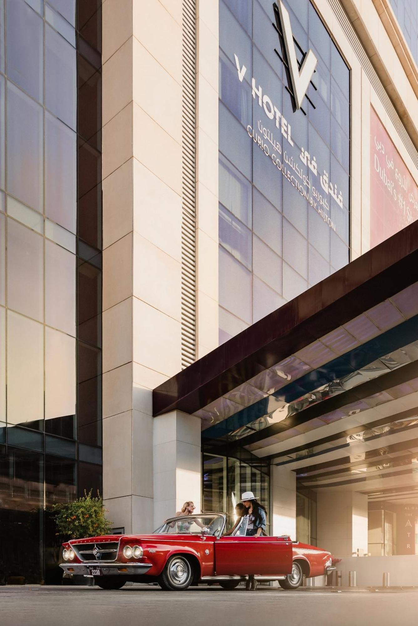 V Hotel Dubai, Curio Collection By Hilton Εξωτερικό φωτογραφία The exterior of the building