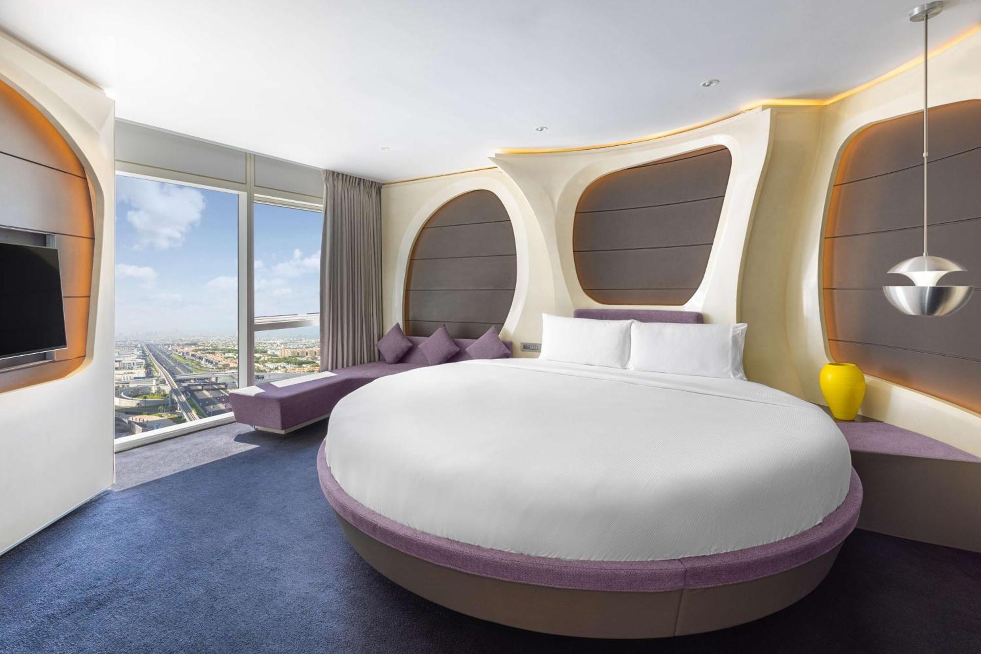V Hotel Dubai, Curio Collection By Hilton Εξωτερικό φωτογραφία A bedroom at the hotel